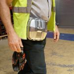 An Oxygen Self Rescuer A person wearing the Oxygen Self Rescuer