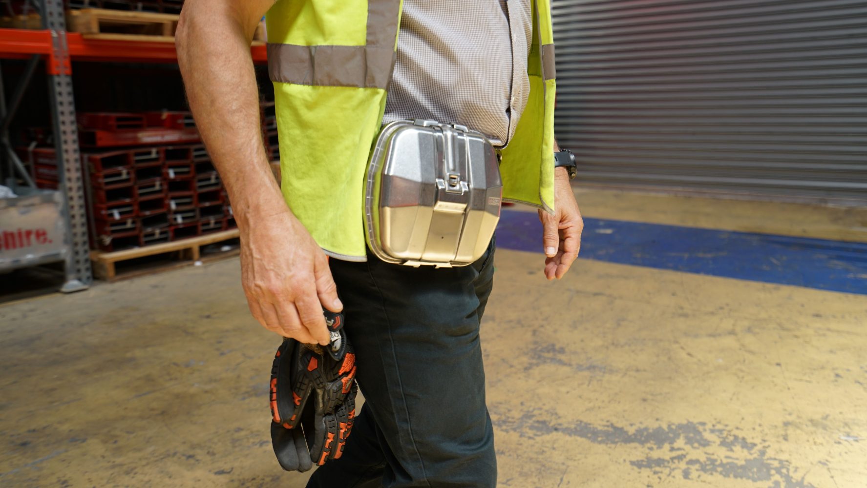 A person wearing the Oxygen Self Rescuer