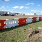 Water Filled Barriers A row of Water Filled Barriers on grass