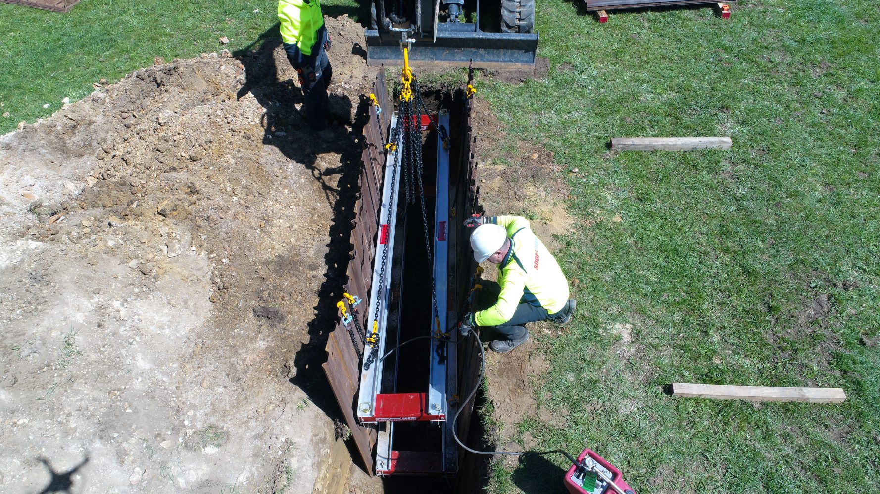 Aluminium Walers being installed into an excavation